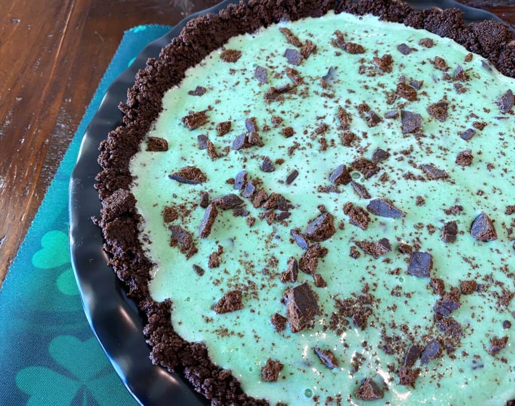Ice cream and Thin Mints poured into cookie crust